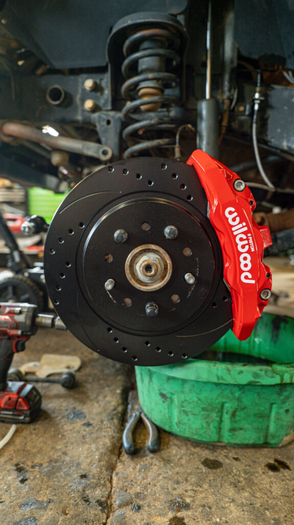 Installed Wilwood AERO6-DM kit Caliper with drilled and slotted rotor
