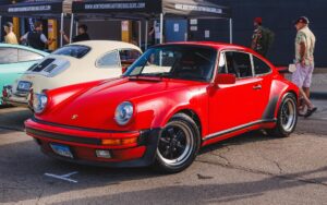 guards red 930 80s sports car