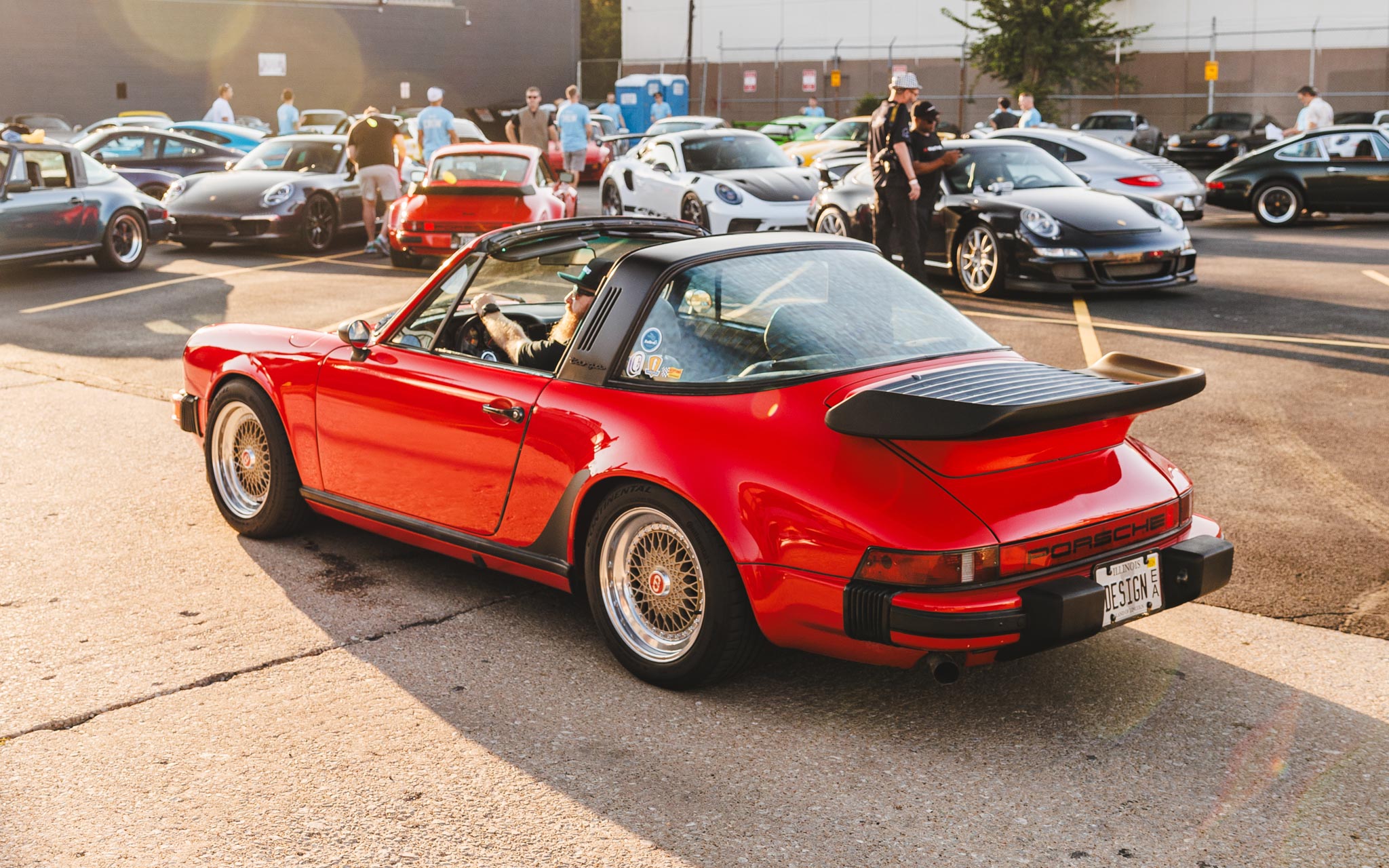 guards red porsche 911 targa