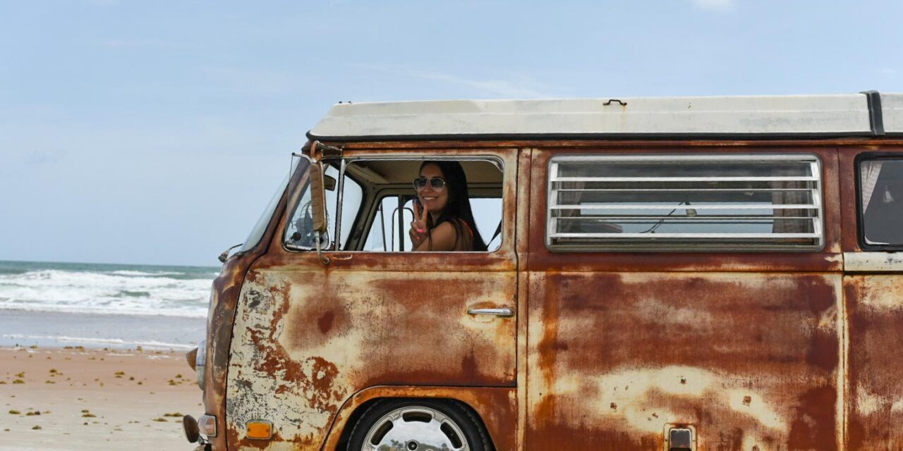 attractive girl old Volkswagen Bus