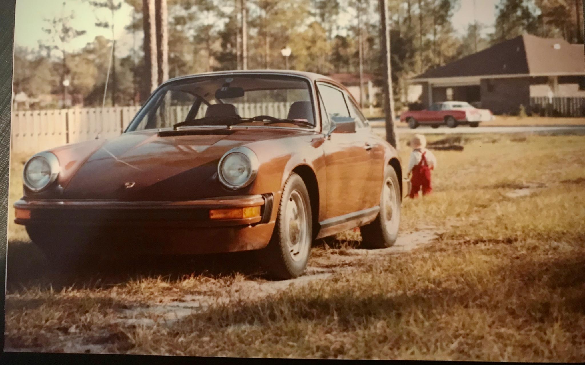 Old photo of a Porsche in the early 80s
