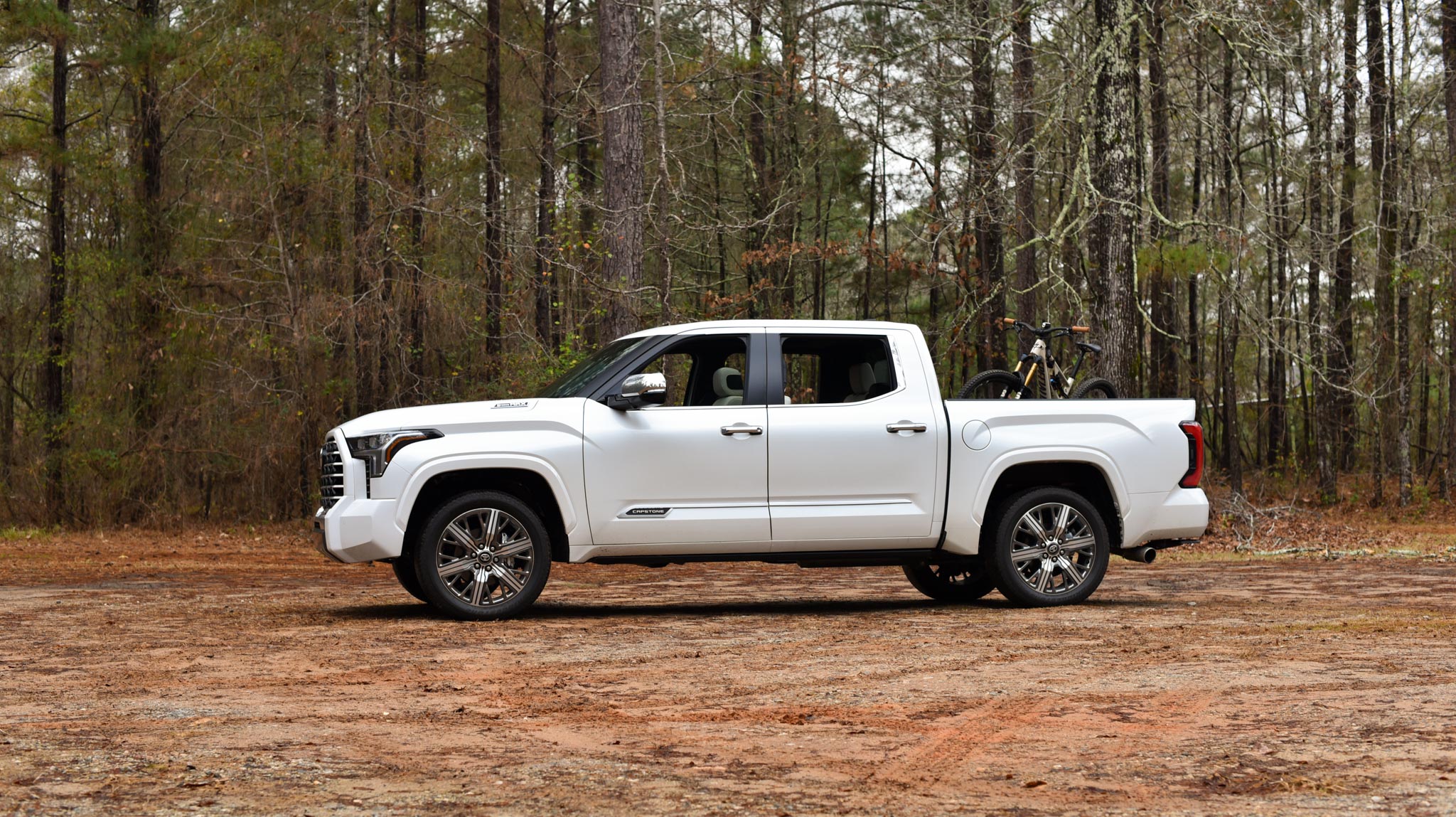 Tundra Capstone driving on dirt or trail